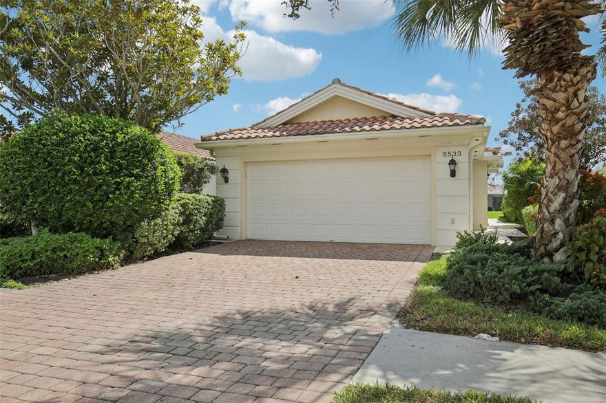 Welcome to the amazing community of Villagewalk in Palmer Ranch.  This 2 bedroom, 2 bathroom waterfront villa is the perfect canvas, in the perfect location for you to create your masterpiece.   The primary bedroom boasts a walk-in closet and an en-suite bathroom with dual sinks and a walk-in shower. The guest bedroom offers its own bathroom and walk-in closet for added privacy.  There is screened lanai with the serene lake view, and the home is a short distance on the cart path to the social community activities. Villagewalk is amenity-rich with security guard gate, a large clubhouse, fitness center, a geo-thermal heated lagoon pool and a geo-thermal heated lap pool. For the sports enthusiasts, there is an active tennis community with six Har-Tru tennis courts, bocce ball and pickleball courts. The town center offers a restaurant/bar, hair salon, boutique and a gas station. Villagewalk is close to Publix, COSTCO, Legacy Trail, fine dining, doctors/medical, shopping and world-famous Siesta Key Beach. Downtown Sarasota with all the cultural venues of a big city is 20 minutes away. Enjoy Florida living.  Schedule your tour today as this property wont last long.