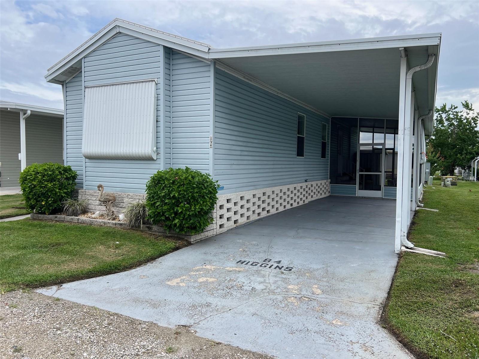 Tucked away off the beaten path within the welcoming 55+ community of Bel Aire Mobile Village, this 2-bedroom, 1.5-bathroom home presents a comfortable retreat in a serene setting. The neighborhood is designed to foster relaxation while also supporting an active lifestyle through its comprehensive amenities. With a modest monthly maintenance fee of $212.00 that covers water, sewer, garbage, and lawn care, residents enjoy a hassle-free living experience within well-maintained surroundings. The community allows one small pet to reside with its owner and features a variety of activities, including an invigorating swimming pool, a social clubhouse, shuffleboard courts, and recreational facilities, ensuring both quiet enjoyment and opportunities for camaraderie.
INTERIOR:
This nicely maintained and fully furnished residence is available for immediate occupancy, offering a split floor plan designed for both tyle and privacy. Recent improvements include the installation of a central heating and air system in 2023. The interior showcases ceiling ducts, ceiling fans, marble windowsills, and faux wood blinds, contributing to an elevated sense of style and comfort. The eat in kitchen features white appliances, a disposal unit installed in 2021, and durable laminate flooring that combines visual appeal with easy maintenance. The living room provides a welcoming environment, suitable for entertaining guests or relaxing. The front bedroom is carpeted and includes an en-suite half-bathroom equipped with a toilet and sink, ensuring added convenience for both guests and residents. The back bedroom offers a spacious layout with carpeted flooring, a large closet, and abundant natural light, creating a bright and comfortable atmosphere. This bedroom makes use of the main bathroom, which is fitted with a tub and shower combination for versatility. Additionally, the indoor washer and dryer located in this bathroom enhances the home's functional and thoughtful design.
EXTERIOR:
This residence is appointed with durable vinyl siding and protective awnings, combining visual appeal with long-lasting performance. The property includes a spacious two-car carport, along with a recently updated roof-over (2025) that further enhances durability and security. A lower-screened room provides an inviting space for outdoor gatherings or relaxation, well-suited to the Florida climate. Additionally, a shed offers generous storage for tools and seasonal items. Priced at $135,000, including a share, this property presents a compelling opportunity for those seeking both value and quality of life. Call today for your private showing!