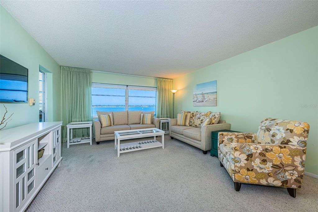 Photo of 4750 Cove Circle #304, St Petersburg, FL 33708 (MLS # TB8503434)
