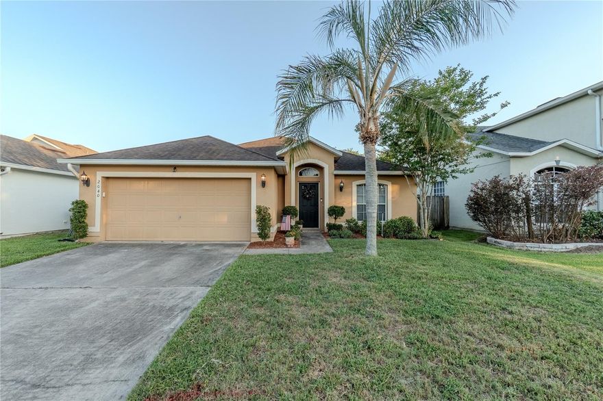 Cute home alert! Finally — an updated, move-in ready home in an amazing Maitland location priced under $400K! Imagine hosting friends and family in the spacious separate dining room, gathering around the oversized kitchen island while dinner cooks, and spending evenings relaxing on the screened patio and playing safely in the fully fenced backyard. Tucked inside the quiet Winfield community with a low HOA, this beautifully maintained 3-bedroom, 2-bath home with split floor plan is an excellent balance of modern style and everyday functionality.

Step inside to discover a bright, open-concept layout featuring vaulted ceilings, recessed lighting, and consistent hard-surface flooring throughout. The spacious living area flows seamlessly into the fully updated gourmet kitchen, complete with beautiful countertops, 42” solid wood soft-close cabinetry, and high-end stainless steel appliances — creating a welcoming space in the heart of your home.

This split floor plan offers both privacy and flexibility, with an expansive primary suite featuring a walk-in closet with custom built-ins and a beautifully updated bathroom with dual vanities, a relaxing garden tub, and separate shower. On the opposite side of the home, two additional bedrooms are ideal for a nursery, guest room, playroom, or home office.

The living space flows to a covered and screened patio, creating a perfect space for year-round indoor-outdoor living. Whether you’re enjoying slow mornings with coffee, hosting weekend get-togethers, or relaxing after work, the fully fenced backyard offers both comfort and privacy. Fresh landscaping, mature shade trees, and the perfect mix of filtered sunlight and greenery give the outdoor space a calm, inviting feel, while the tiled flooring adds a clean, polished touch that’s both stylish and low maintenance.
ROOF: 2018