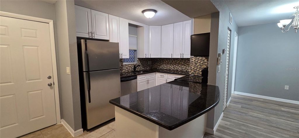 Photo of 11913 Congressional Drive #11913, Tampa, FL 33626 (MLS # TB8450875)