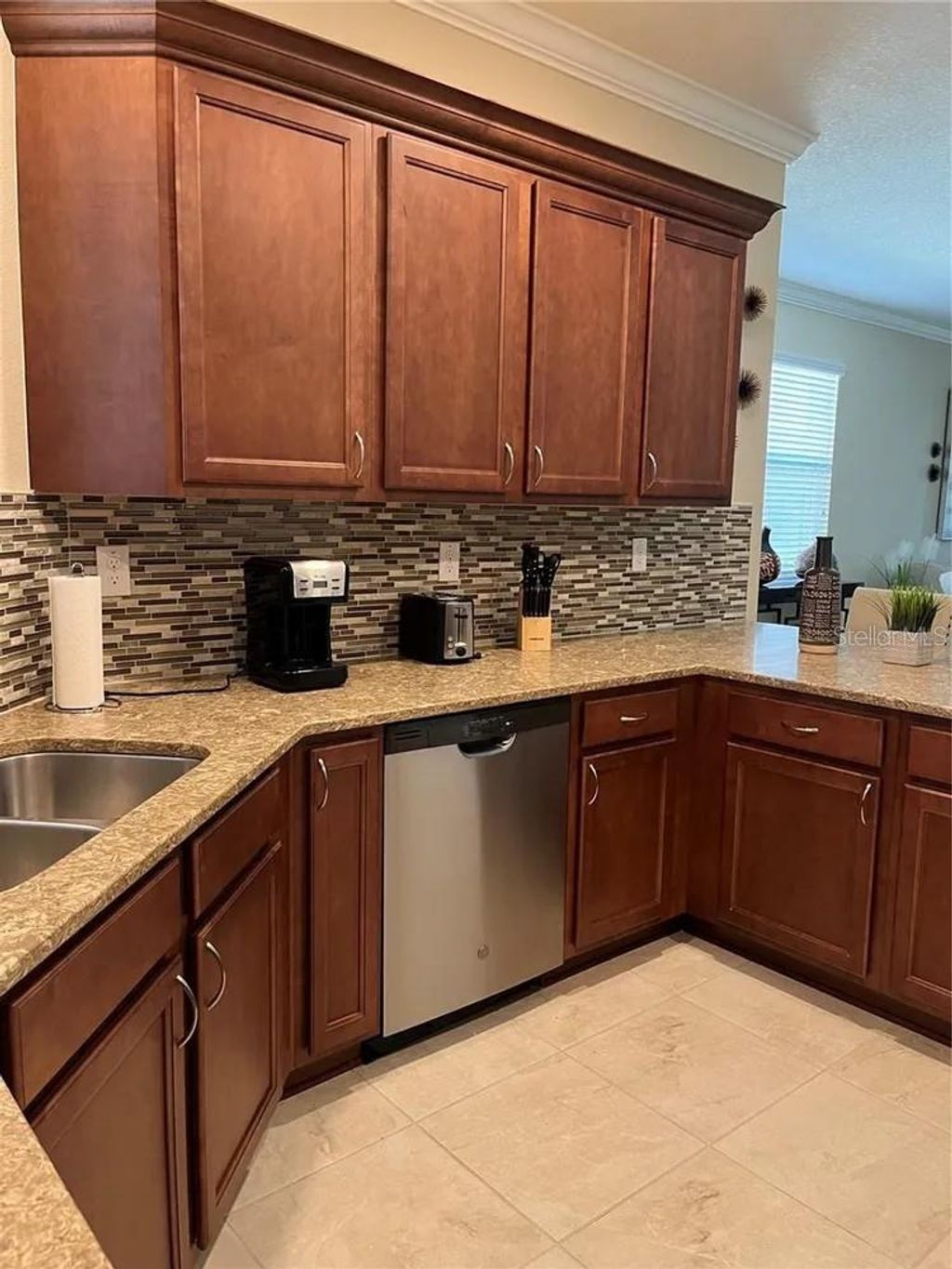 Photo of 9879 SW 99th Loop, Ocala, FL 34481 (MLS # OM721600)