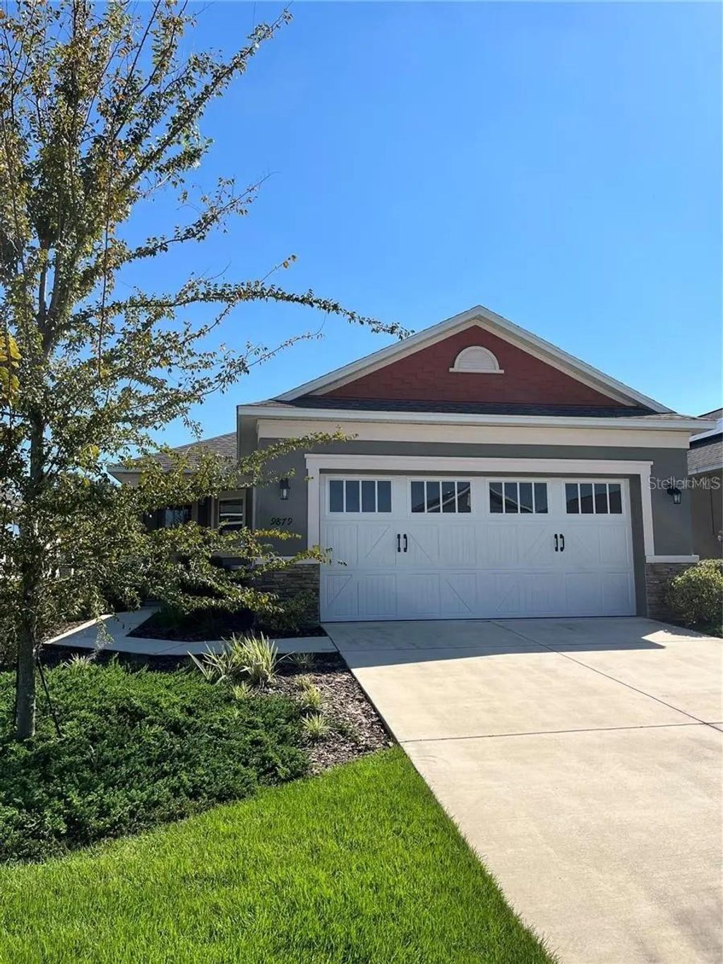 Photo of 9879 SW 99th Loop, Ocala, FL 34481 (MLS # OM721600)