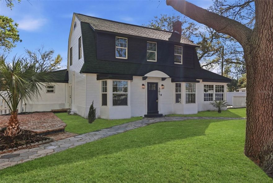 One or more photo(s) has been virtually staged. Charming Renovated house with Modern Kitchen & Rare Oversized Lot, Located in the desirable Northeast St. Petersburg area, this beautifully updated two-story farmhouse-style residence blends historic character with modern upgrades and thoughtful design improvements.
Originally built nearly a century ago, the home has been carefully renovated to preserve its architectural charm while incorporating contemporary finishes and functionality throughout. Inside, the bright interior features luxury vinyl plank flooring, custom trim work, and an inviting living space anchored by a fireplace that creates a warm focal point for gathering and entertaining.
The redesigned kitchen showcases quartz countertops, a modern kitchen sink, custom cabinetry, and brand-new top-of-the-line KitchenAid appliances. A standout feature is the 30-inch KitchenAid electric slide-in range with integrated downdraft ventilation, allowing the ventilation system to be built directly into the cooktop so a traditional overhead hood is not required. This system efficiently removes smoke and cooking odors while maintaining a clean, open kitchen design.
The layout offers three bedrooms, two full bathrooms, and a newly added half bath, providing additional convenience for guests. The spacious primary suite offers generous proportions rarely found in homes of this era and provides ample room for a seating area or workspace.
Exterior French doors open directly onto the outdoor deck, creating easy access for outdoor dining, relaxing, and entertaining.
Set on a distinctive oversized irregular lot, the property benefits from a unique triangular configuration that creates additional outdoor space, privacy, and mature oak trees that provide shade and character rarely found in traditional rectangular parcels.
Outdoor features include a wood deck and brick paver patio ideal for relaxing or entertaining.
Additional improvements include a roof replacement completed in 2020.
The property is conveniently located just minutes from downtown St. Petersburg, waterfront parks, shopping, restaurants, medical centers, and major commuter routes. Riviera Bay Park—with pickleball, tennis, and basketball courts—is also nearby.
This home offers a unique opportunity to enjoy the charm of a historic residence with modern upgrades in one of St. Petersburg’s most established and desirable neighborhoods.