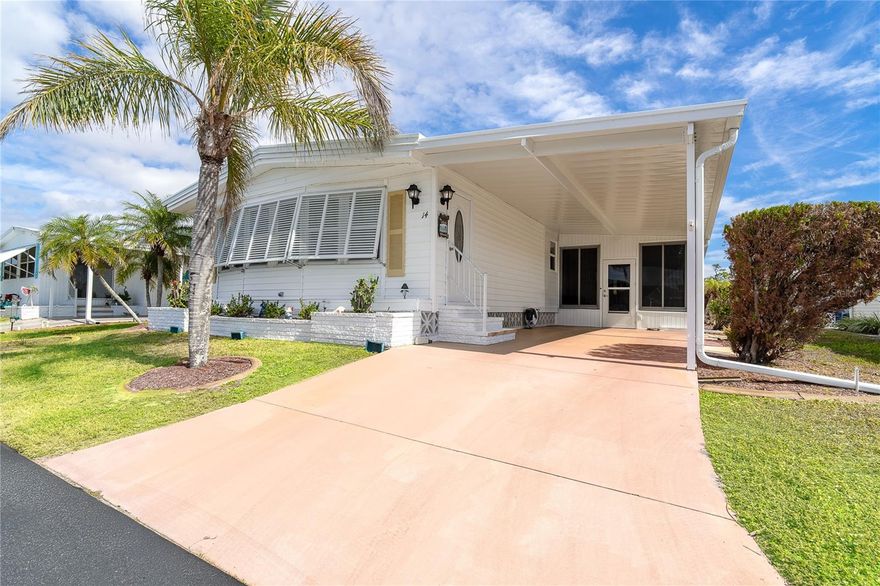 If you want to live in the HIGHLY DESIRABLE, MANUFACTURED HOME COMMUNITY of ALAMEDA ISLES..then look no further, as this TWO-BEDROOM, TWO BATHROOM, DOUBLE WIDE manufactured home can be yours! TURN-KEY FURNISHED, BRAND NEW A/C 2025, both BATHROOMS ARE REMODELED, and boast WALK-IN SHOWERS! There are 2 FLORIDA ROOMS, YES 2, complete with furnishings and plenty of sunshine...just perfect for bringing the outside inside! ROOF is 6 YRS. OLD, NEWER REFRIGERATOR, WATER HEATER is 3 YRS. OLD...COZY and COMFORTABLE is the best way to describe this BEAUTIFUL home! You can't help but love this home, which features a LARGE BAY WINDOW in the living room, EAT IN KITCHEN with a BREAKFAST BAR, STAINLESS STEEL APPLIANCES and a LARGE CARPORT with a driveway long enough for two vehicles. LOCATION, LOCATION, as this home is just around the corner from all the wonderful amenities this gated community offers: Year-round HEATED SWIMMING POOL & Sunshade, Therapeutic SPA, EXERCISE FACILITY, TENNIS, PICKLEBALL, SHUFFLEBOARD Courts, PICNIC FACILITIES, Kayaks/KAYAK LAUNCH, BOCCE Courts, GOLF PUTTING GREEN and Practice Area, WOODWORKING SHOP, RV/BOAT STORAGE area and Marina BOAT SLIPS (Required Separate Lease). CLUBHOUSE Complex houses a large hall with kitchen and stage, CRAFT ROOM with kiln, BILLIARDS room, LOUNGE/CARD ROOM & LIBRARY. There is Free Wi-Fi throughout clubhouse. This 55 AND OLDER, resident owned, 56-ACRE, WATERFRONT COMMUNITY with a PRIVATE PARK and 59 slip Marina with access to the intracoastal, Lemon Bay, and Gulf of Mexico, is just waiting for you! Close to the HISTORIC DOWNTOWN DEARBORN, boasting weekly Flea Markets, day & evening live entertainment, quaint shops & dining! Our beautiful COASTAL BEACHES are just minutes away, as are shopping, the best of local dining and golf courses...anything you want is just so close! Don't miss the opportunity to make this wonderful home, your next HOME SWEET HOME!! Schedule an appt. today..EASY TO SHOW!