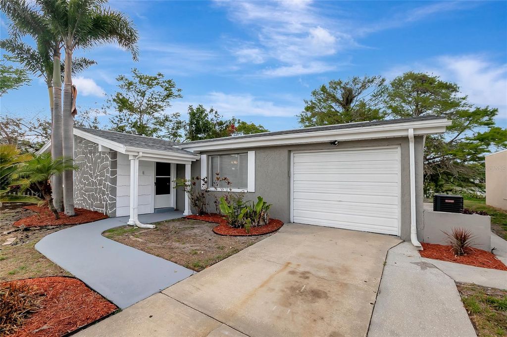 Photo of 4111 Stratfield Drive, New Port Richey, FL 34652 (MLS # TB8450446)