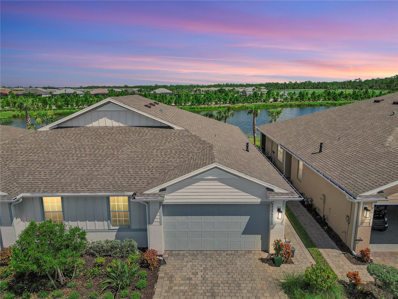 Welcome to this stunning Carrington model villa tucked away in the Preserve, offering one of the most serene settings you’ll find. Perfectly positioned on a quiet cul-de-sac, this home boasts a breathtaking wide lake view with no homes across the water—just nature, sunsets reflecting on the lake, and the beauty of Bill Hammond Trail Preserve as your backdrop.
Inside, you’ll find thoughtful upgrades throughout, including Plantation shutters, ceiling fans in every room with mounted controls, and a dual UV light air purification system with surge protection for the HVAC (professionally serviced every six months). The kitchen is a showpiece with white quartz countertops, a subway tile backsplash, under-cabinet lighting, and custom pantry shelving.
The layout is both functional and elegant, featuring a den with double doors, five TV wall mounts (included), and plenty of extra storage in the master closet with custom shelving and a large built-in medicine cabinet in the master bath. Additional conveniences include a smart home system that allows you to control lights and AC from your phone, an installed AT&T security alarm system, and hurricane-impact glass throughout for peace of mind.
Step outside to enjoy the extended patio with upgraded landscaping and garden space, complete with roll-down shades for comfort. This north-facing backyard captures peaceful lake reflections at sunset and attracts an array of birds, creating a private retreat you’ll love.
The Preserve community offers maintenance-free living with a private pool, lap swimming, and vibrant social events like Wine Wednesdays, Bingo, and game nights.
This villa combines comfort, security, and an unmatched setting—a rare opportunity to enjoy the very best of Preserve living.Schedule your private showing today! LOW HOA's !! Enjoy living in Babcock Ranch, America's first entirely solar-powered town, with access to multiple community pools, nature trails, with shopping and dining. Come enjoy the convenience living with festivals, farmer's markets, Concerts, Health gym and just a golf cart ride to the grocery store. There is so much to do with hundreds of clubs and activities planned every month. There is a K-12 neighborhood school with a brand new sports complex, including football, soccer and baseball fields. There are many playgrounds and parks, including multiple dog parks and a brand new skate park and six new parks along the nature trails. Babcock Ranch is a top master planned community and was featured on CNN and 60 Min for not losing any power or internet after hurricane Ian made a direct hit and Milton came very close. Beautiful parks and amenities let you experience SW Florida at its finest! Come live a better life at Babcock Ranch!