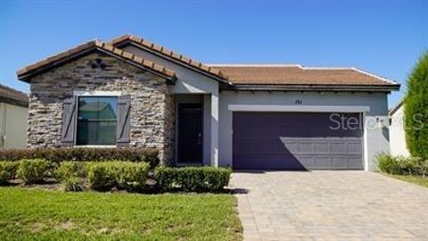 Photo of 161 Kenny Boulevard, Haines City, FL 33844 (MLS # O6371171)