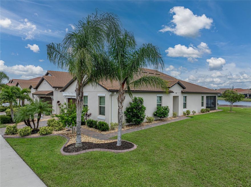 Welcome to Resort-Style Living in Medley at Southshore Bay! 
This rarely available end-unit villa is a true gem, offering 2 bedrooms, 2 bathrooms, a versatile bonus room, and breathtaking pond views from nearly every angle. Situated on an oversized lot with no neighbors to the side or behind, this home gives you the ultimate in privacy and tranquility.
Step inside and you’ll be impressed by the beautiful finishes and thoughtful upgrades throughout:
Gorgeous white cabinets and granite countertops in the kitchen and bathrooms. Wood-like plank tile flooring in the main living areas for style and easy care. Expanded driveway for extra parking. Custom professional landscaping that makes this home shine.
An EXTRA golf cart garage with golf cart path, in addition to the front-facing 1-car garage. Chip Painted floors in both garages and the screened-in lanai for durability and style.  A bonus room perfect for a home office, man cave, or extra sleeping space. A peaceful lanai overlooking the water, perfect for morning coffee or evening sunsets!



Located in the highly desirable 55+ Medley community, you’ll enjoy access to a world-class 5-acre lagoon, resort-style clubhouse, tiki bar, pickleball courts, fitness center, and endless activities.  

This villa truly combines comfort, convenience, and a MAINTENANCE FREE lifestyle — all with one of the best views in the neighborhood!
