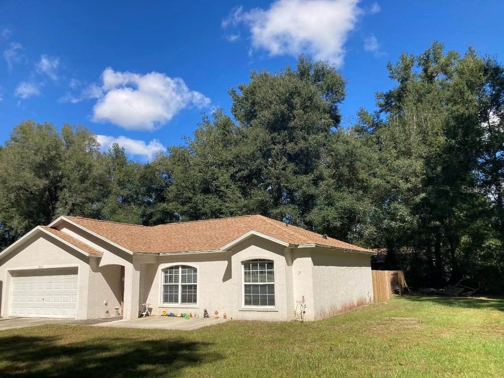 Photo of 3073 SE 142nd Lane, Summerfield, FL 34491 (MLS # TB8422227)