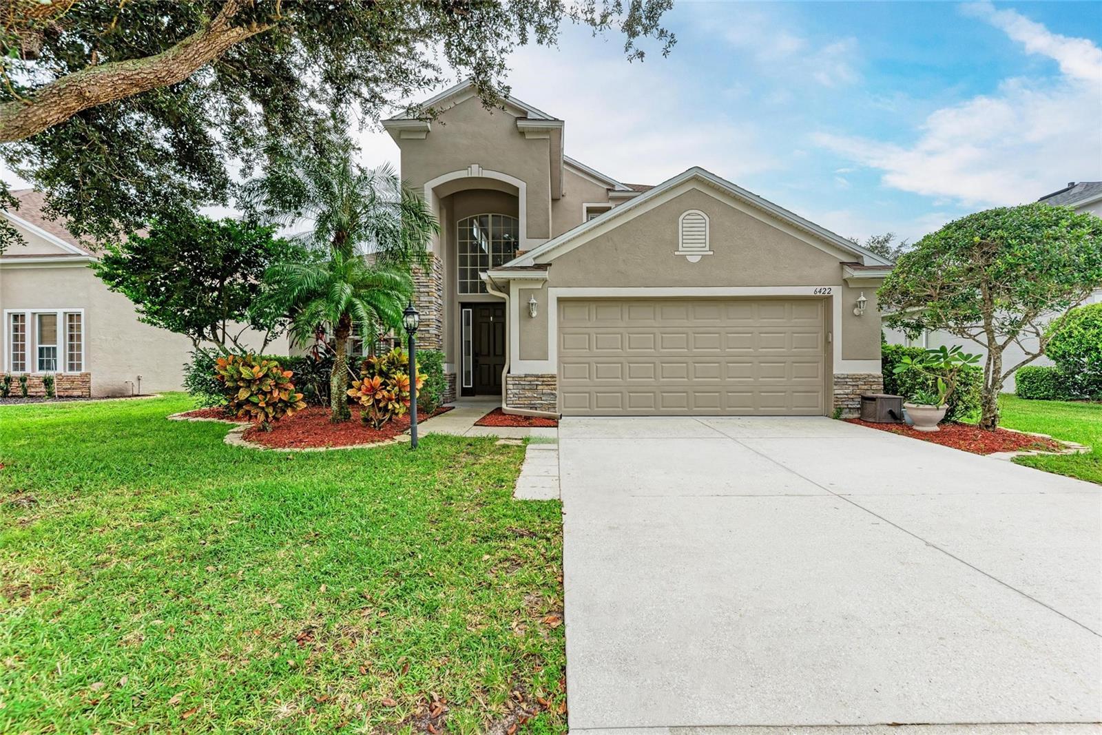 Discover this stunning Kimball Hill Hartford II model, a beautiful two-story home nestled in the highly sought-after Greenbrook Village of Lakewood Ranch. Featuring 4 spacious bedrooms, 3.5 bathrooms, an extra office space, and a brand new roof, this residence offers the perfect blend of comfort and functionality. Situated on a premium lakefront lot with ample room for a pool, the property boasts elegant laminate floors throughout the main living areas and the master suite.
The open and airy floorplan includes stainless steel appliances in the modern kitchen, perfect for entertaining. Unwind on the covered lanai while enjoying breathtaking views of the serene lake—a wonderful retreat for relaxation. Located just minutes from Greenbrook Adventure Park, residents have access to a playground, basketball courts, soccer fields, a hockey rink, dual dog parks, and scenic walking and biking trails.
Enjoy the convenience of nearby top-rated schools, low HOA fees of only $105 annually, and a picturesque trail system winding through the neighborhood. Explore charming creeks, wooden bridges, and vibrant wildlife, all within close proximity to shopping, dining, outdoor recreation, and pristine white-sand beaches in Sarasota, Bradenton, St. Pete, and Tampa. This exceptional home combines community charm with impeccable location—don’t miss your opportunity to make it yours!