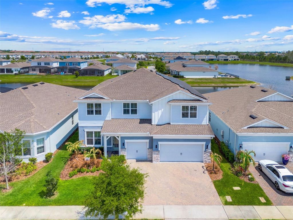 Photo of 13827 Tybee Beach Lane, Orlando, FL 32827 (MLS # O6395239)