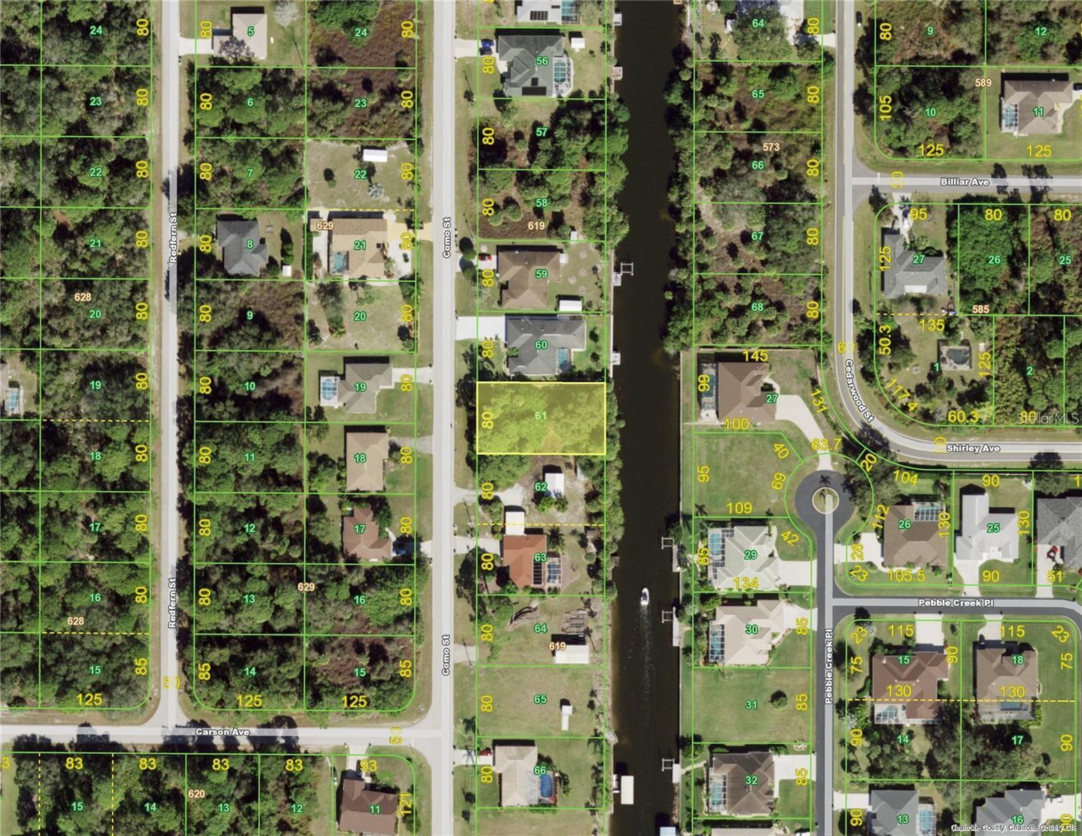 PORT CHARLOTTE WATERFRONT LOT - Don't miss this opportunity to invest in the future while prices are still low. This beautiful oversize waterfront lot offers 80 feet on a salt water canal with access to Charlotte Harbor and out to the Gulf of Mexico. With a desirable East facing rear exposure the lot is 145 FT deep and enough room for a pool to overlook the canal. Build your dream home and enjoy fishing and boating right from your backyard. Centrally located in an established neighborhood with CITY WATER available and not in a Scrub Jay review area according to Charlotte County records.