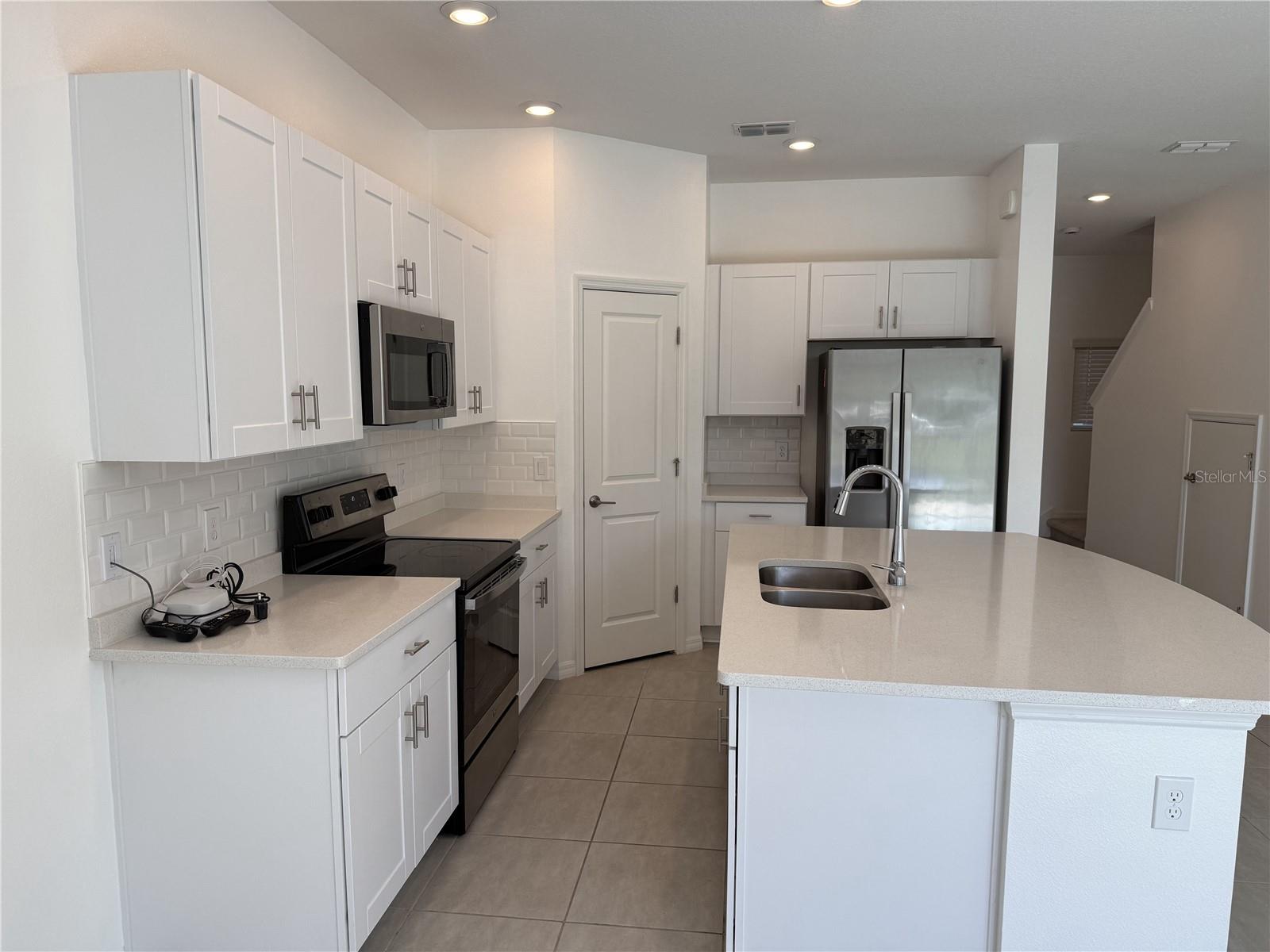 THE TOWNHOMES AT BELLALAGO - Residential Lease