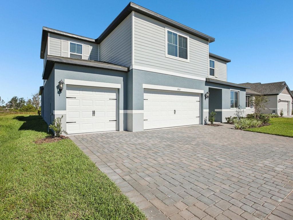 Photo of 1922 Coolridge Place, Zephyrhills, FL 33541 (MLS # O6342332)