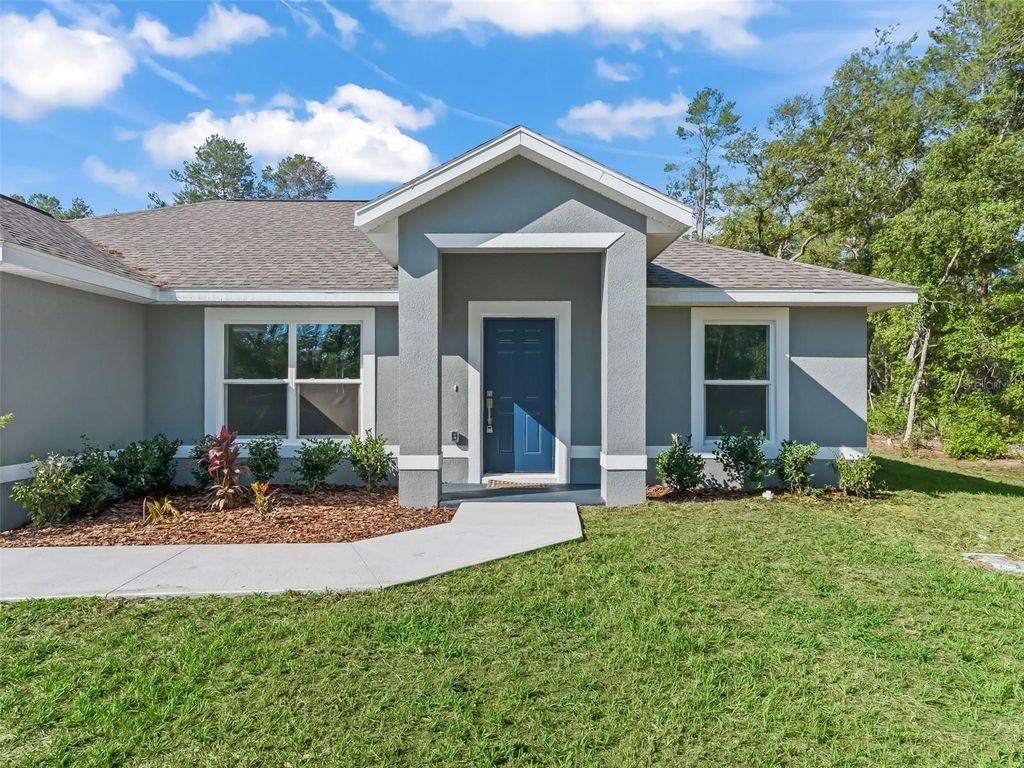 Photo of 4986 SW 166th Loop, Ocala, FL 34473 (MLS # OM724255)