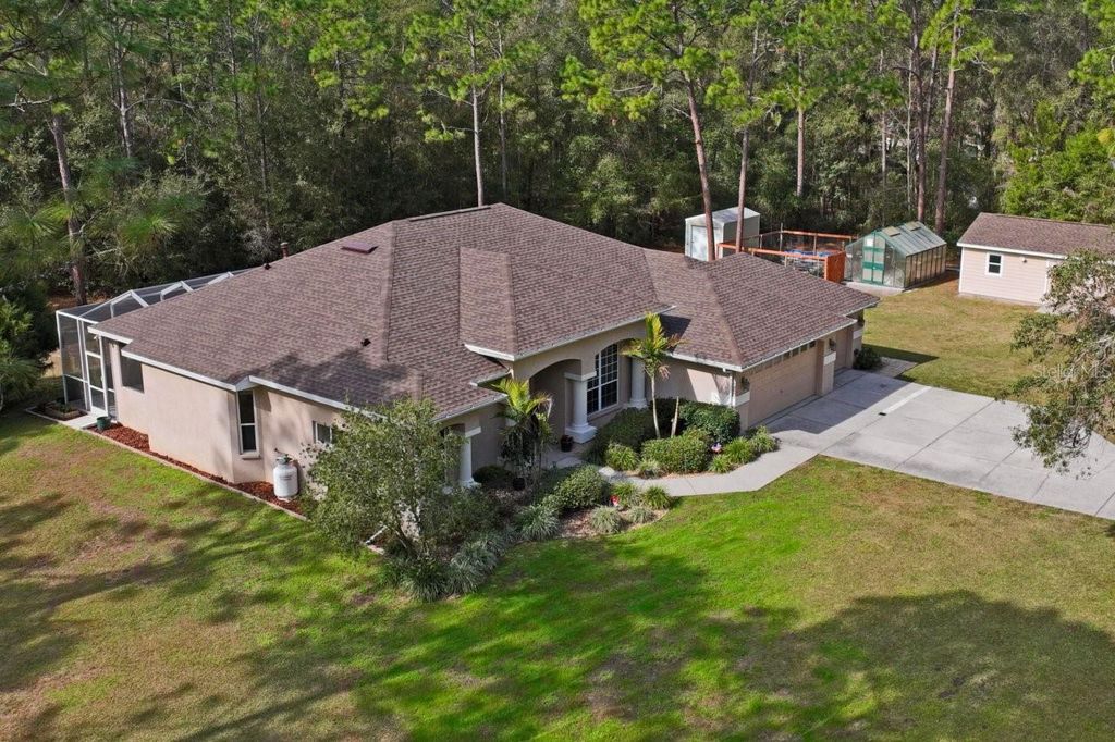 Photo of 7049 Poppas Pass, Brooksville, FL 34602 (MLS # TB8462041)
