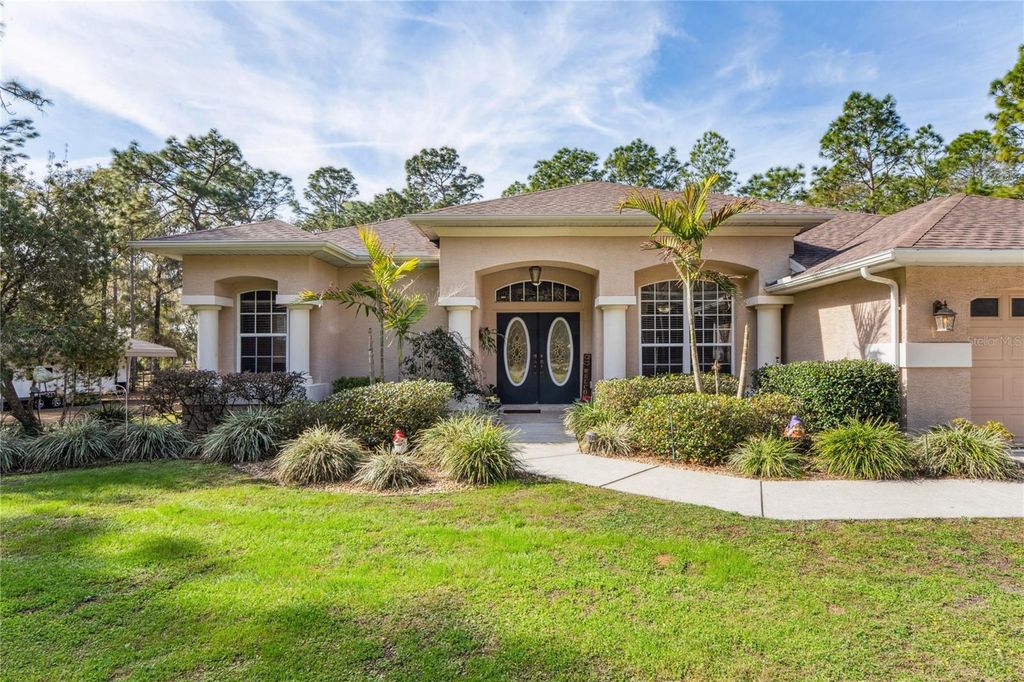 Photo of 7049 Poppas Pass, Brooksville, FL 34602 (MLS # TB8462041)