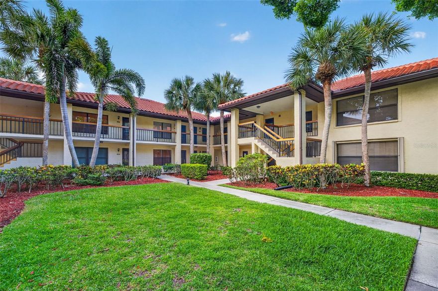 Welcome to one of the most exceptional 1-bedroom condos in all of Clearwater! Perfectly positioned within the highly sought-after gated community of Hammock Pine Village, this beautifully maintained second-floor corner residence offers the ideal blend of privacy, comfort, and effortless Florida living. Surrounded by peaceful wooded views and lush landscaping, this home feels like a private retreat while remaining close to everything Clearwater has to offer.  Inside, you’ll find a spacious and thoughtfully designed floor plan featuring an oversized primary suite complete with a generous walk-in closet and private ensuite bath, plus an additional half bath for guests. Natural light fills the home, enhancing the inviting living spaces and creating a bright, airy atmosphere throughout. Step onto the screened balcony and enjoy your morning coffee or evening wine while taking in the tranquil surroundings and beautiful year-round Florida weather.  This condo is move-in ready with major recent upgrades, including double-pane windows with plantation shutters, a new washer/dryer, new flooring, hurricane shutters, a 2022 electric panel, 2016 HVAC with new coils, and a 2021 water heater, offering both comfort and peace of mind for years to come. Assigned parking and private storage provide added convenience rarely found at this price point.  Residents of Hammock Pine Village enjoy resort-style amenities including a sparkling community pool, tennis courts, meticulously maintained grounds, and the security of gated access—all with surprisingly low monthly HOA fees. Even better, the HOA covers cable, internet, water, sewer, trash, exterior maintenance, and grounds care, making this an incredibly easy and affordable lifestyle choice.  Ideally located just minutes from Countryside Mall, top-rated dining, golf courses, shopping, entertainment, and the world-famous Gulf beaches, this condo offers the perfect combination of location, lifestyle, and value. Whether you’re searching for a full-time residence, seasonal escape, or low-maintenance Florida retreat, this is truly a rare opportunity to own one of Clearwater’s finest 1-bedroom condos.