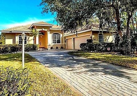 Photo of 1704 Amberwynd Circle W, Palmetto, FL 34221 (MLS # O6411265)