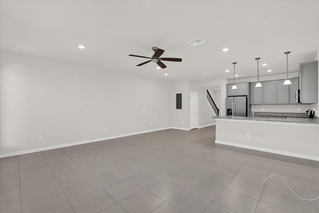 Photo of 10877 Wooded Acre Alley, Orlando, FL 32829 (MLS # O6388988)