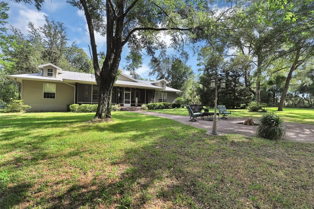 Photo of 7802 N Fairwind Loop, Hernando, FL 34442 (MLS # OM703722)