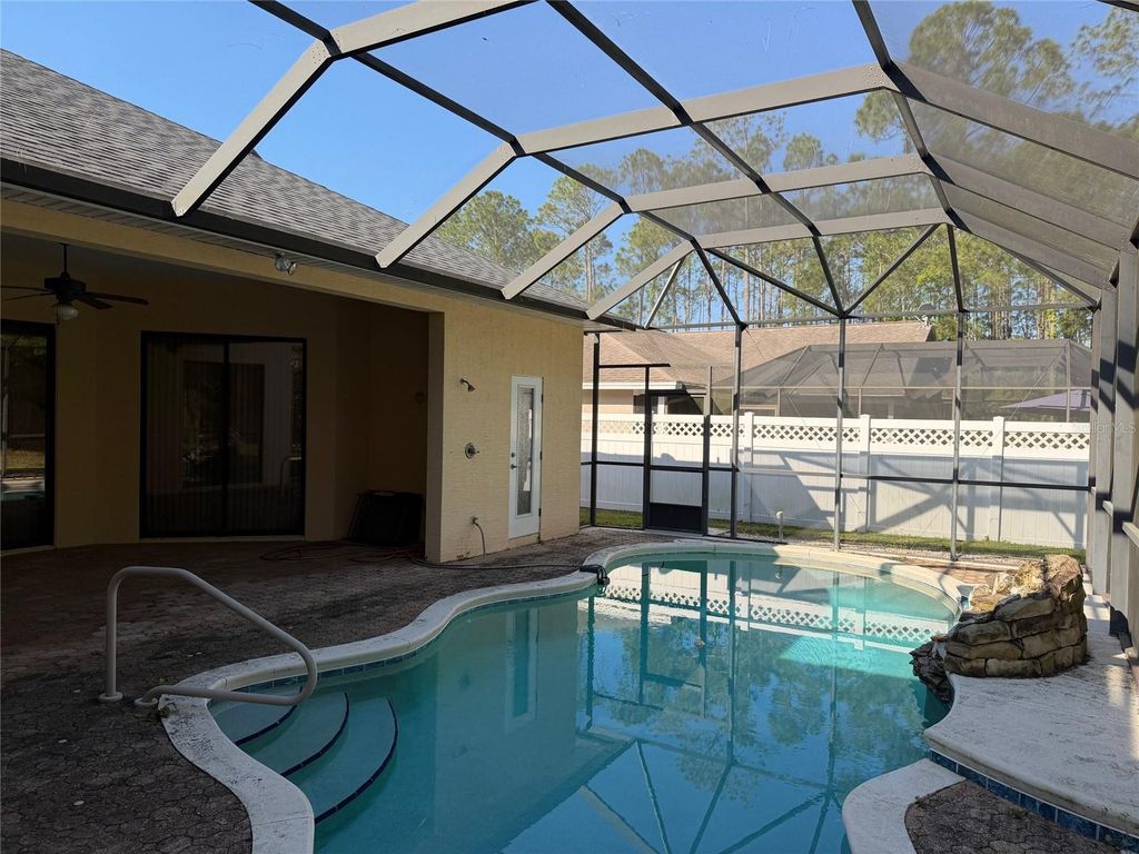 Photo of 31 Woodhollow Lane, Palm Coast, FL 32164 (MLS # O6398377)