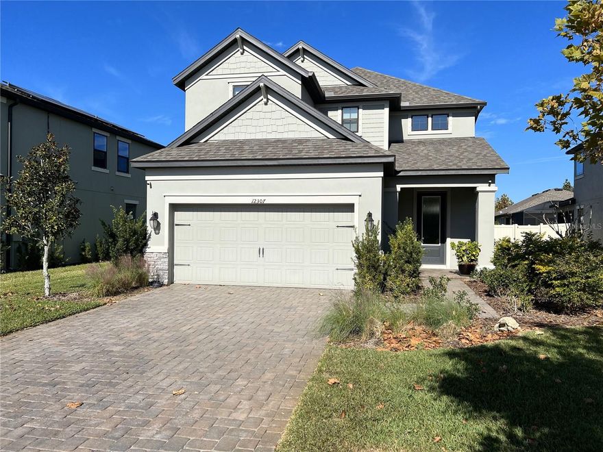 Welcome home to your 4bed/3bath/2 car garage home available in the highly desirable community Starkey Ranch for lease! Very welcoming, bright, & clean home available for immediate occupancy. Tile wood floors through out the first floor. Stunning kitchen with gas range, 42" shaker wood cabinets, quartz counter tops, pantry, and large kitchen island. Very open modern lay out on first floor.  First floor has full bedroom (great use for an office) and full guest bathroom. Updated wood stairs lead to your private bedrooms quarter. Large master with an ensuite master bath - dual sink vanity, beautifully tiled floor to ceiling shower, and HUGE walk-in closet. 2 additional guest rooms with large closets and private updated bathroom.  Upstairs laundry room for convenience.  Outback enjoy your covered & screened back lanai overlooking your large fenced yard.  Starkey Ranch is a serene like neighborhood for all outdoor lovers, providing 3 community pools, multiple playgrounds throughout, over 20miles of walking/running/biking trail paths, dog parks, community garden, kayak lake, and more. Tibbets St is close to the Starkey Ranch K-8 School, the library/theater, and District Park offering fields for all your favorite sports & an amazing playground. Starkey Ranch offers an activities director with fun for all ages. Excellent schools, 30mins to airport, 30mins to beautiful beaches, nearby major shopping, restaurants, and nightlife. This home has been meticulously maintained and is in excellent condition - truly TURN KEY!