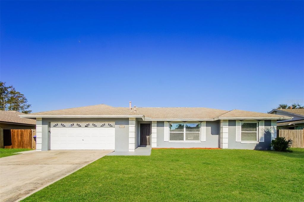 Photo of 2317 Tinian Avenue, Orlando, FL 32837 (MLS # O6395997)