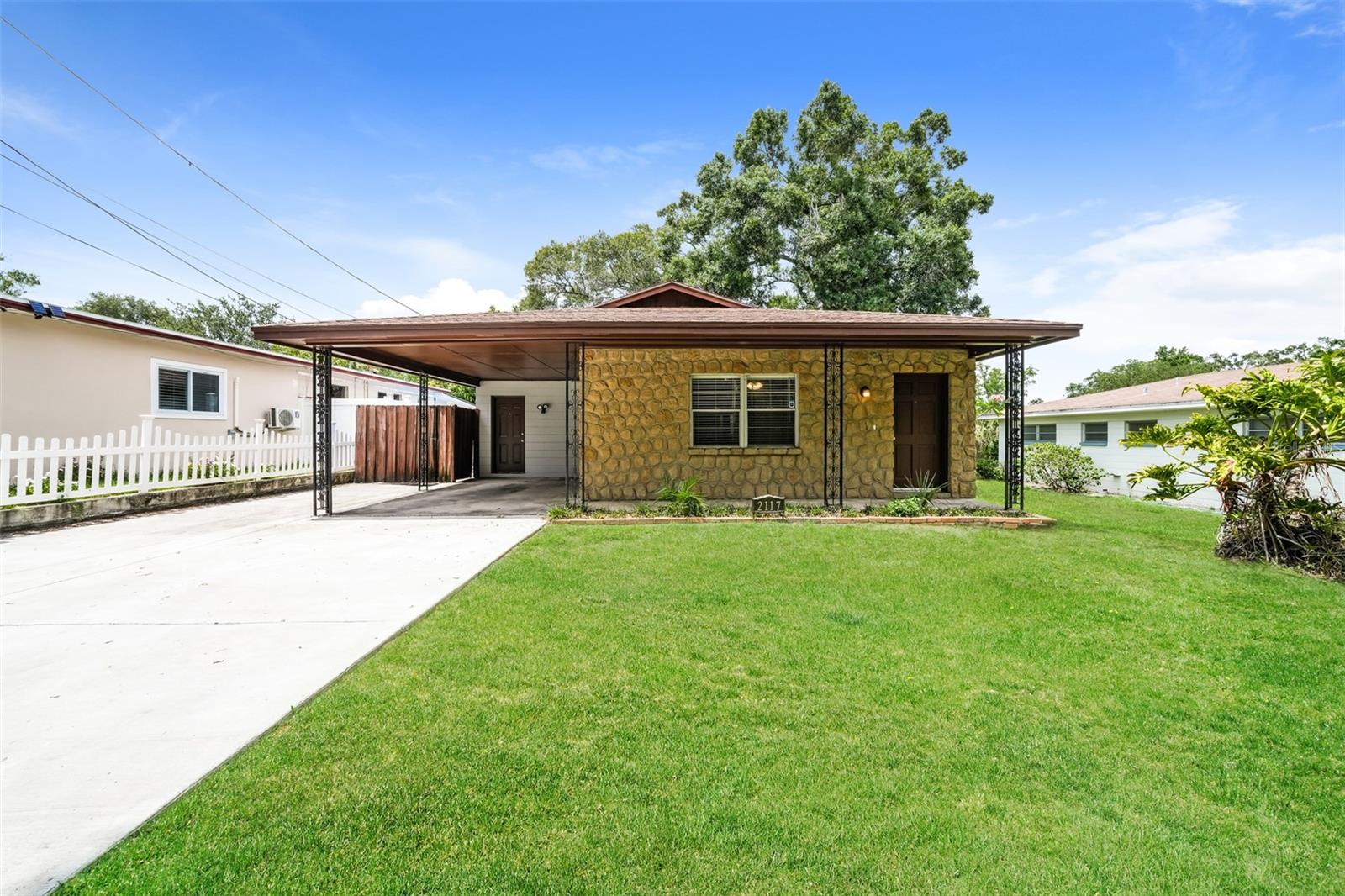 Charm and curb appeal abound for this Tampa home! Step inside into the well-appointed living room and through into the home's dining room. The kitchen boasts stainless steel appliances, hard surface countertops, and ample storage. Rounding out this ranch style floorplan is the primary suite, two secondary bedrooms, and a laundry room. Enjoy your private, enclosed backyard all year long! Come and see for yourself the possibilities that this home has to offer.