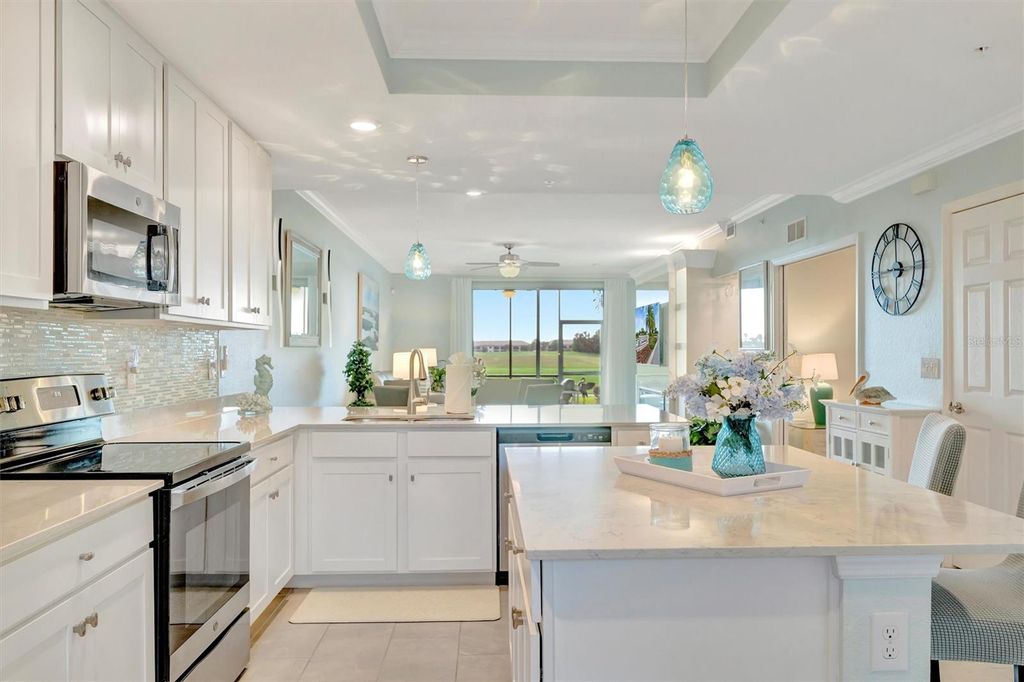 Photo of 5664 Palmer Circle #105, Bradenton, FL 34211 (MLS # A4674349)