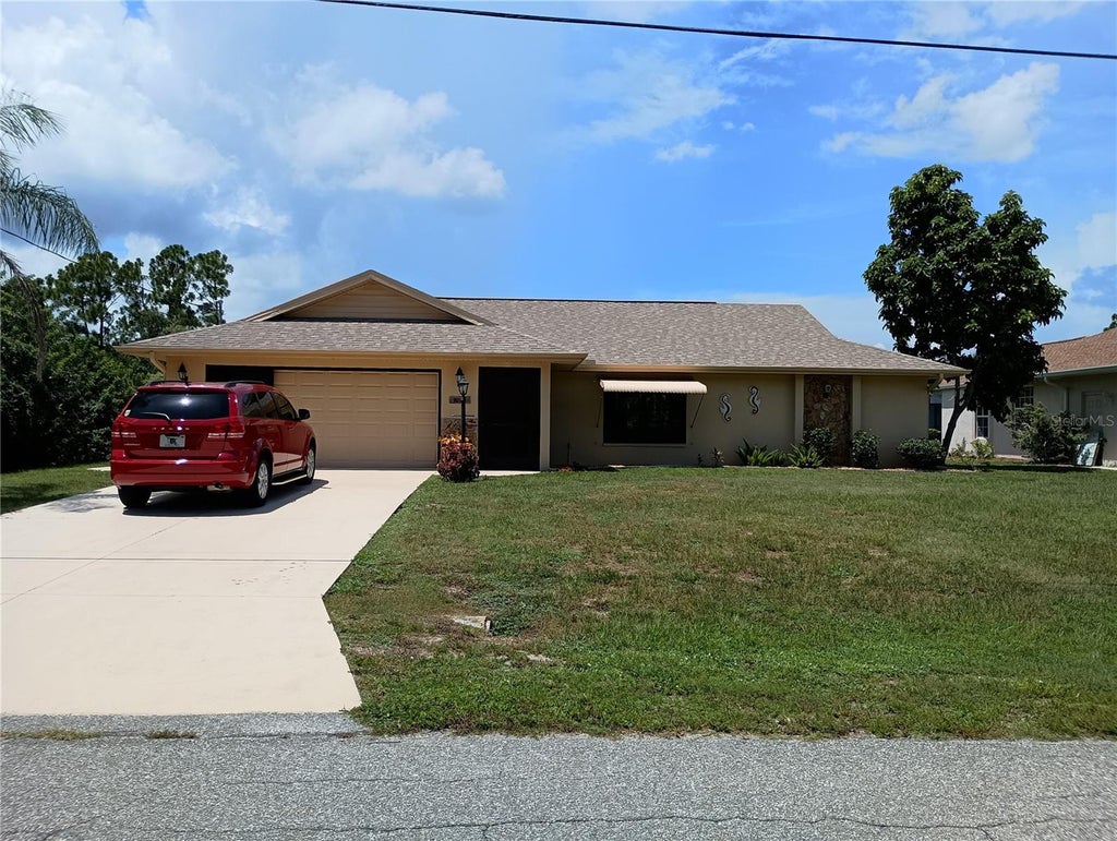 Photo of 3047 Cabaret Street, Port Charlotte, FL 33948 (MLS # D6148483)