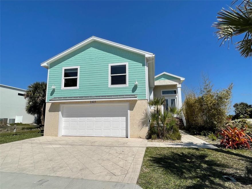 Built in 2019! Direct Oceanfront Beach House. Full sun saltwater pool. Full unobstructed views north and south. There is Massive rental income because it is in the short term rental zone. So, when not making family memories, you are making strong CASH income on this investment.The Master bedroom is up and another on the ground floor, both with sunrises and ocean views. There's a Deep two car garage with parking for 3 more in the driveway. 4 guest bedrooms with 3 baths. Two half baths, one per floor. Large media/game room with ping pong, separate pool table, and card table. Private boardwalk from pool to beach. Four blocks north of no-drive beach. Large kitchen with granite, gas cooktop, stainless appliances. Large dining area and island with seating. Double ice maker refrigerators upstairs and downstairs. Washer and dryer upstairs and downstairs. High speed internet, 8 New 4k Ultra HD Smart TVs in bedrooms and main areas. Elevator ready or keep the large owner's closets. Instant gas hot water system, 20 yr. aluminum metal roof. Good dining, shopping, entertainment and recreation within walking distance and a mile to Flagler Ave shops and restaurants/bars.