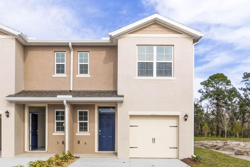 Under Construction. Introducing the Pearson – where modern elegance meets everyday functionality in this stylish townhome. Located in Hawthorne Ranch in Lakeland, Florida. Step into sophistication as you enter through the one-car garage into a spacious and welcoming abode with 1,463 square feet.

The heart of the home, a sprawling living space, beckons with its ample room and abundant natural light. Whether entertaining guests or enjoying a quiet night in, this versatile area adapts effortlessly to your lifestyle needs. Adjacent to the living space lies the dining nook and gourmet kitchen, a chef's delight adorned with sleek cabinetry, premium stainless-steel appliances, and a stunning center island. Gather around the island for casual meals or culinary adventures, as the kitchen effortlessly blends style with functionality.

Upstairs, three comfortable bedrooms await, providing space for rest and relaxation. The primary bedroom offers a peaceful retreat, complete with a walk-in closet and a luxurious ensuite bath featuring dual sinks, and walk-in shower. With 2 1/2 baths throughout the home, convenience is never far away. Whether getting ready for the day or unwinding in the evening, you'll appreciate the thoughtful design and attention to detail in every corner of the Pearson.

Like all homes in Hawthorne Ranch, the Pearson includes all concrete block and also smart home technology, which allows you to control your home anytime with your smart device while near or away.

Experience the ultimate in modern living with this thoughtfully designed townhome, where comfort and style converge to create the perfect sanctuary for you and your loved ones. Welcome home to the Pearson – where every day is an invitation to live life to the fullest. Schedule a tour today in Hawthorne Ranch.

*Photos are of similar model but not that of the exact house. Pictures, photographs, colors, features, and sizes are for illustration purposes only and will vary from the homes as built. Home and community information including pricing, included features, terms, availability, and amenities are subject to change and prior sale at any time without notice or obligation. Please note that no representations or warranties are made regarding school districts or school assignments; you should conduct your own investigation regarding current and future schools and school boundaries.*
