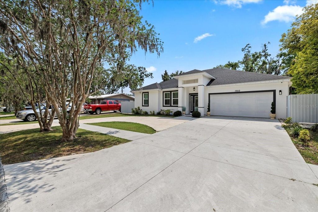Photo of 19212 Sunlake Boulevard, Lutz, FL 33558 (MLS # TB8385075)