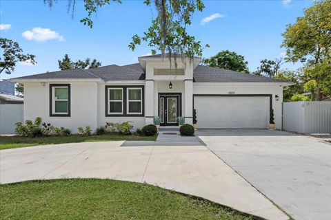 Photo of 19212 Sunlake Boulevard, Lutz, FL 33558 (MLS # TB8385075)