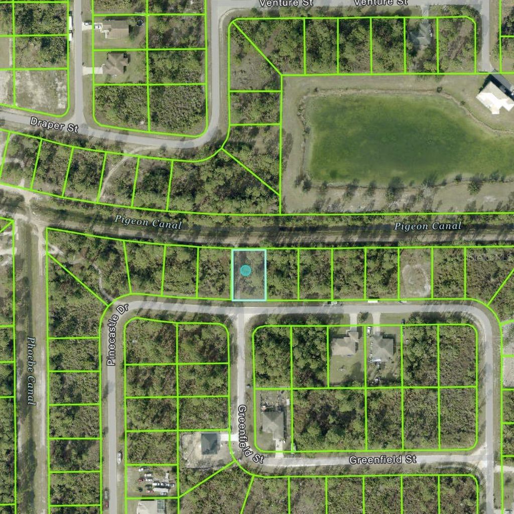 Photo of 743 Pinecastle Drive, Lehigh Acres, FL 33974 (MLS # C7518633)