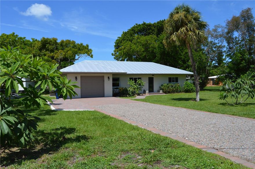 Coastal Retreat on the Water – Monthly Rental Available December 2025 and April–December 2026
Welcome to Dazzling Dona, your fully furnished/turnkey paradise, situated directly on the water with breathtaking sunset views every evening. This stunning 2-bedroom, 1.5-bath, large 1 car tandem garage is just 2 miles from Nokomis Beach and the boat launch, offering the perfect base for beach lovers and water enthusiasts alike. Parking available for your boat/trailer and the boat ramp is 2 miles away. Bring your kayak, or paddle board – a floating dock is ready for your adventures, and the sunsets over the water will leave you speechless. Keep an eye out for manatees playing in the water just beyond your door!

Inside, this model furnished home radiates coastal elegance with its block walls, top-of-the-line stainless steel appliances, and pristine quartz countertops. The open and airy layout includes a restful king bedroom, a cozy queen bedroom with a dedicated office space, and a washer/dryer for added convenience. With hurricane-rated windows and doors, plus an epoxied garage floor, this home is as durable as it is stylish.

The outdoor space is perfect for relaxation, featuring a fire pit, paver patio, swaying palm trees, and a Weber grill – ideal for dining al fresco after a day on the water. Bikes are available for exploring the nearby Legacy Trail, and Nokomo’s Sunset Hut is within walking distance for a leisurely dinner or drinks. Venice Island, with its vibrant shops, dining, and cultural experiences, is just minutes away.

Located close to I-75 and Sarasota Memorial Hospital, this home offers both serenity and convenience. Don’t miss out on this rare opportunity to experience waterfront living with amazing sunset views – book your stay today!

Note: Owner is also the agent and retains possession of the boat/boat lift.