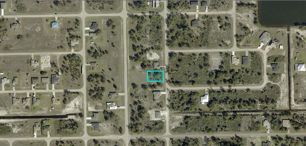 Photo of 1024 Maxwell Avenue S, Lehigh Acres, FL 33974 (MLS # A4689522)