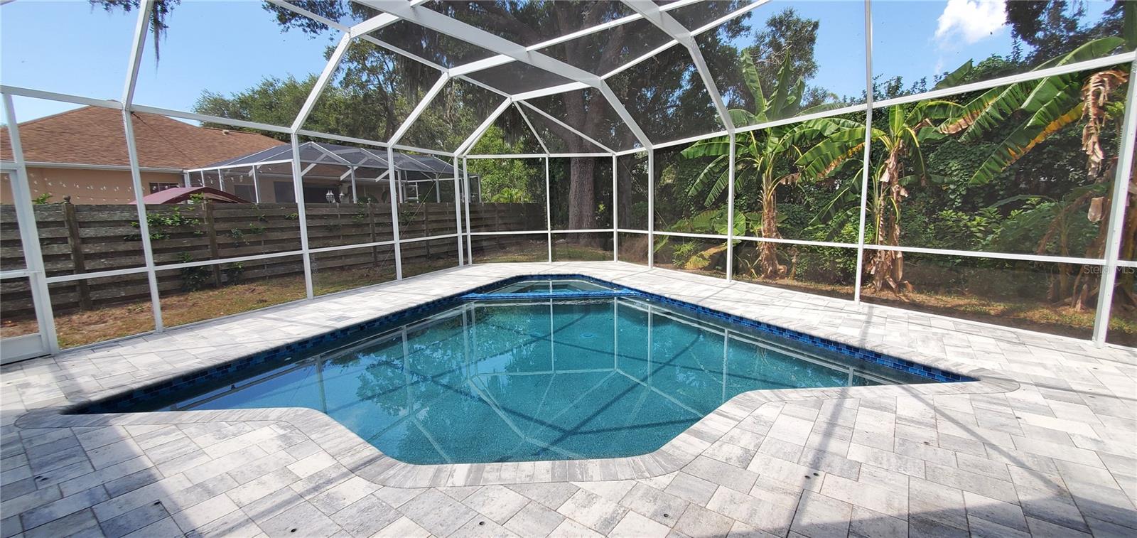 Greenfield Community - Single Family Home with NEW Pool and 2-Car Garage. AVAILABLE for MOVE IN after Aug 22nd. This beautiful one-story 3 bedroom + den, 2.5 bath home features a beautiful kitchen with stainless steel appliances adjoining the family room with a view of the pool (heated/electric) and backyard. Appliances new within last two years: water heater, one of two A/C heat pumps, refrigerator and microwave. The pool and spa include WiFi and app control capability. The pool enclosure is screened with a covered area for outside dining. Smart thermostats, smart washer and dryer, smart refrigerator. Easy and quick access to lots of shopping, dining and entertainment options. Legacy Trail is 1.5 miles from the property. First, last and security is required. Good credit (680+) and background and income of at least 3x the rent is required. Grounds maintenance, pool maintenance, trash pickup and pest control is included. One small dog is permitted under 35 lbs with a $500 refundable deposit. School district is Ashton Elementary, Sarasota Middle and Sarasota High. HOA requires community application to be submitted no less than 30 days prior to lease start date. Lindsay Leasing application takes typically 2-5 days.