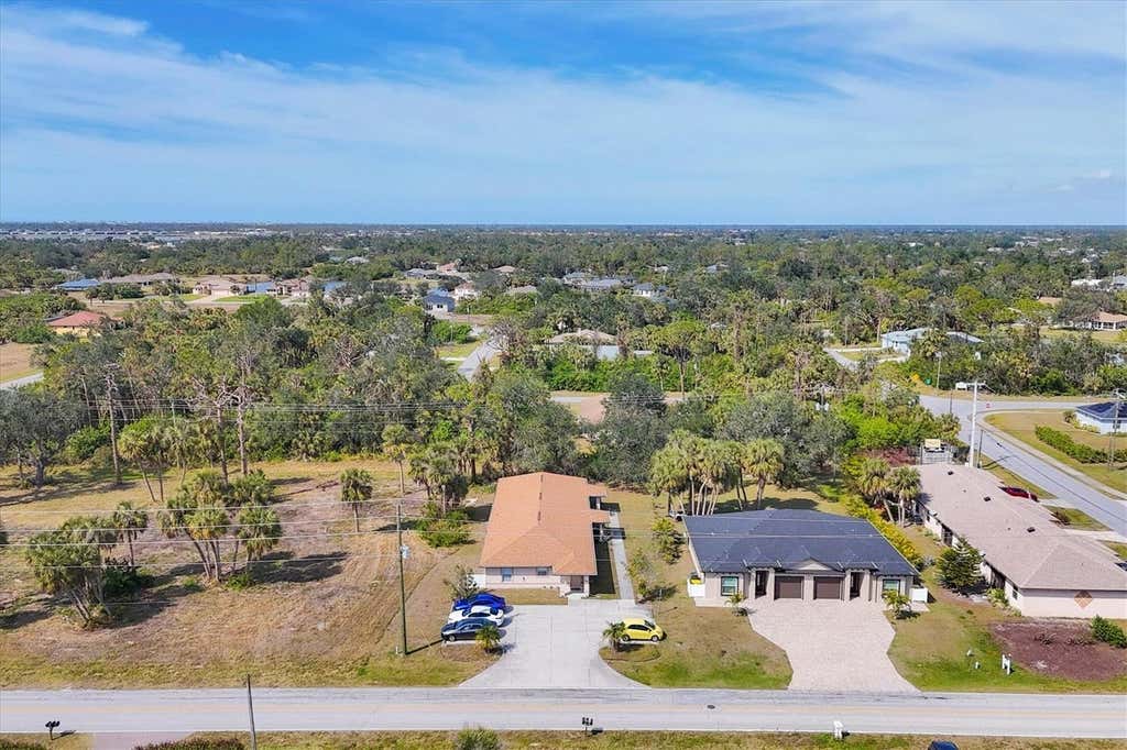 Photo of 355 Boundary Boulevard #C, Rotonda West, FL 33947 (MLS # D6147703)