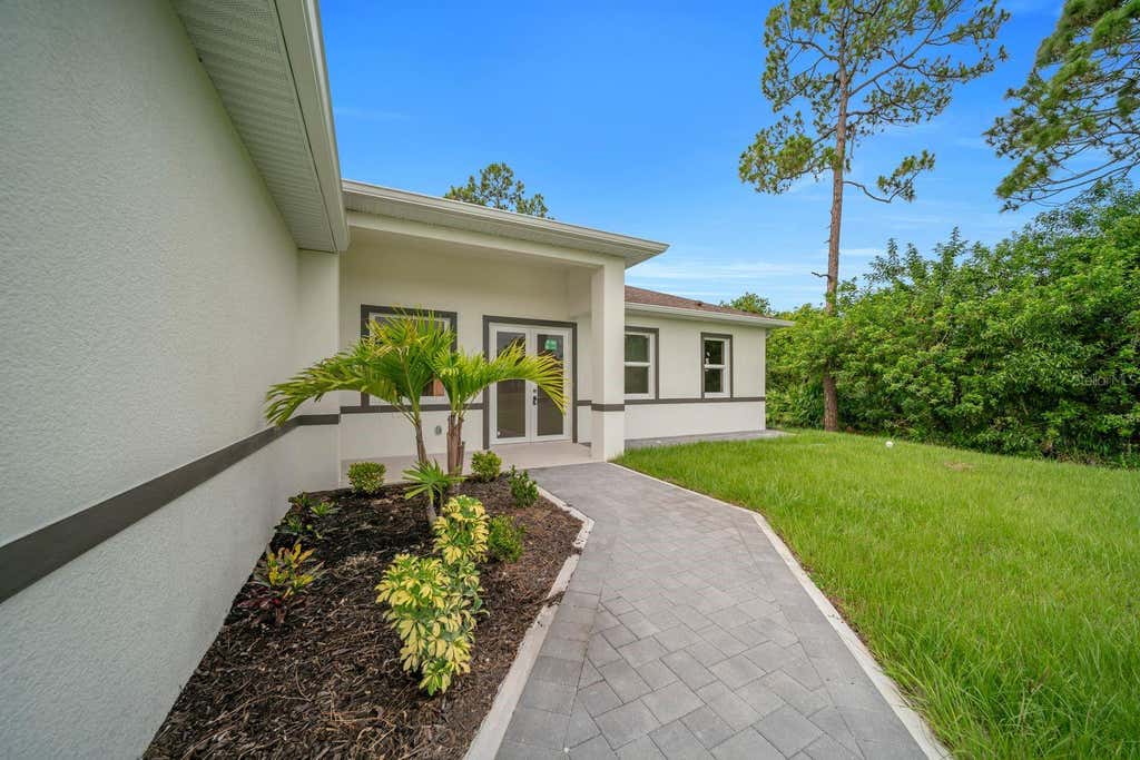 Photo of 2715 10th Street W, Lehigh Acres, FL 33971 (MLS # A4696954)