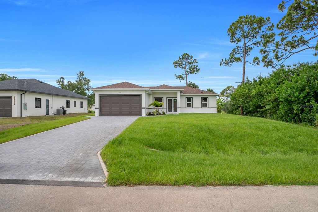 Photo of 2715 10th Street W, Lehigh Acres, FL 33971 (MLS # A4696954)