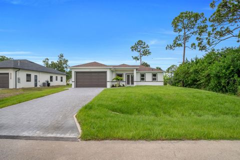 Photo of 2715 10th Street W, Lehigh Acres, FL 33971 (MLS # A4696954)