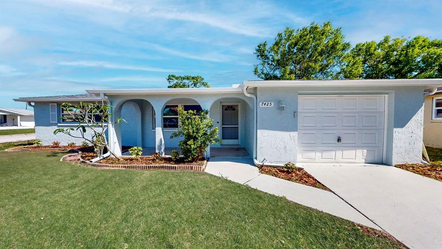 Get ready to fall in love with this charming corner-lot home at 7425 Betula Drive. Surrounded by neat landscaping and set on a level lot that offers both privacy and great curb appeal, this three-bedroom ranch-style home blends classic character with modern updates.

Step inside and you’re welcomed by an open-concept living area filled with natural light from double-pane windows. Luxury vinyl flooring runs throughout, and the spacious 17x15 living room provides the perfect layout for relaxing or hosting friends. The dining area, measuring 15x9, flows easily from the living space and leads into a modern kitchen featuring stone counters, solid wood cabinets, and stainless steel appliances.

Inside the home, you’ll also find a convenient laundry room with washer and dryer hookups and extra storage.

The primary bedroom, located at the back of the home, offers an 18x11 layout, a walk-in closet, and direct access to the updated bathroom. Two additional bedrooms also include walk-in closets, making them perfect for guests, an office, or hobby space. Interior details like ceiling fans, a smart thermostat, and an open floor plan add comfort and practicality.

Step outside to enjoy Florida living on the screened rear porch, ideal for morning coffee or quiet evenings. A welcoming front porch adds charm, and the backyard shed provides extra storage. The spacious corner lot also offers boat and RV parking, and the attached one-car garage adds convenience. A chain-link fence helps keep pets and little ones safe.

This home is equipped with central air and heat, public utilities, high-speed internet access, and a solid slab foundation. With no HOA and no lease restrictions, the property offers flexibility for homeowners or investors.

Located within city limits on a paved street, the home is easy to access while still offering a comfortable sense of privacy. It’s the kind of place that makes you feel right at home the moment you arrive.

7425 Betula Drive is more than a house, it’s a welcoming space with charm, functionality, and room to grow. Your next chapter begins the moment you step through the front door.