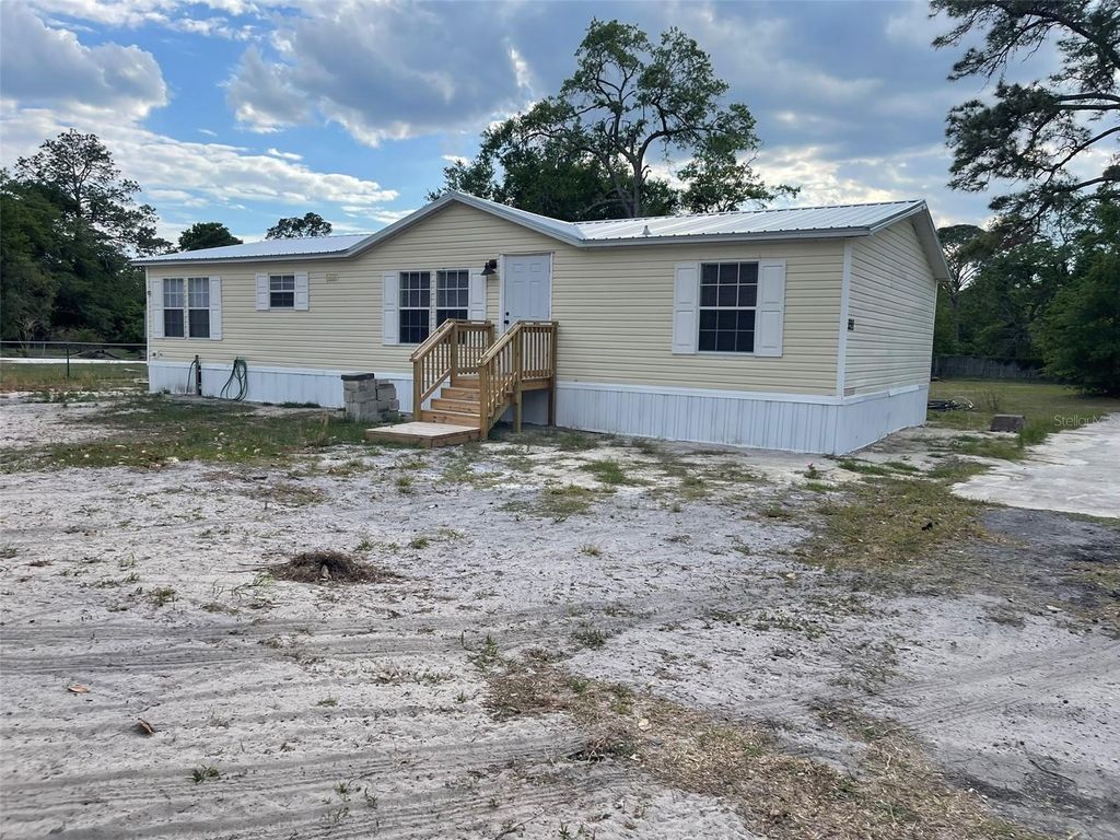 Photo of 13716 NE County Road 1471, Waldo, FL 32694 (MLS # GC540090)