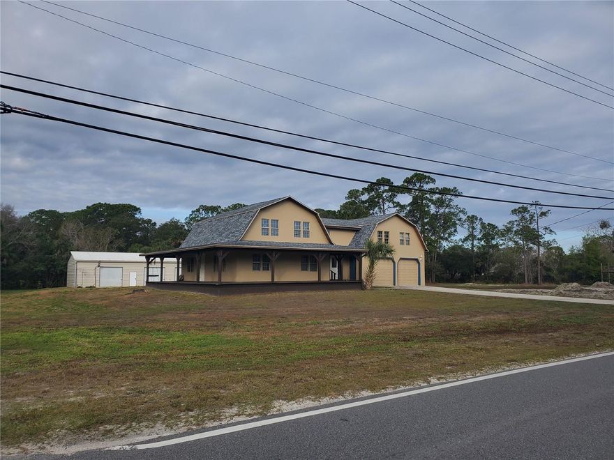 Great opportunity to own a two (2) acre home site in Canaveral Groves. There is plenty of room to store toys, boats and trailers. This property has a pond along with an 1800 square foot workshop with three (3) garage bays. A fire pit area with gazebo is in place for outdoor entertainment. Wrap around porch. The house requires some TLC. This property is perfect for an owner who wants to gain market value through sweat equity. The possibilities are endless. Easy access to major highways. Don't miss out on the chance to purchase this home
