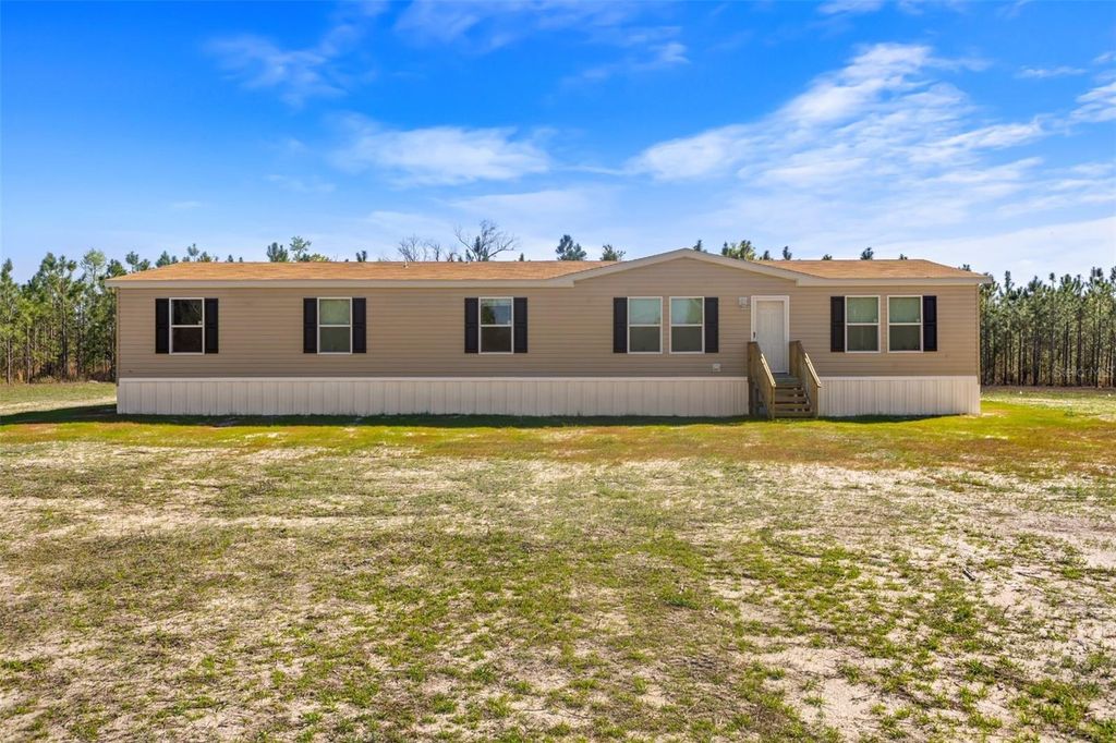 Photo of 20774 78th Trace, Live Oak, FL 32060 (MLS # W7885047)