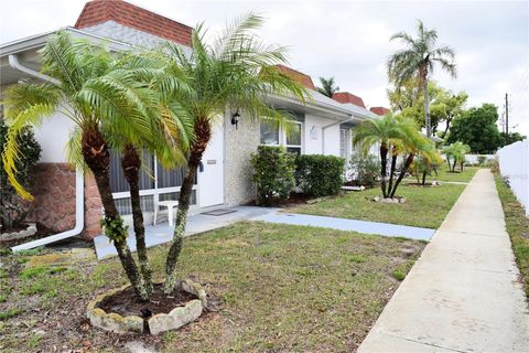 Photo of 4357 Tahitian Gardens Circle #E, Holiday, FL 34691 (MLS # TB8494740)