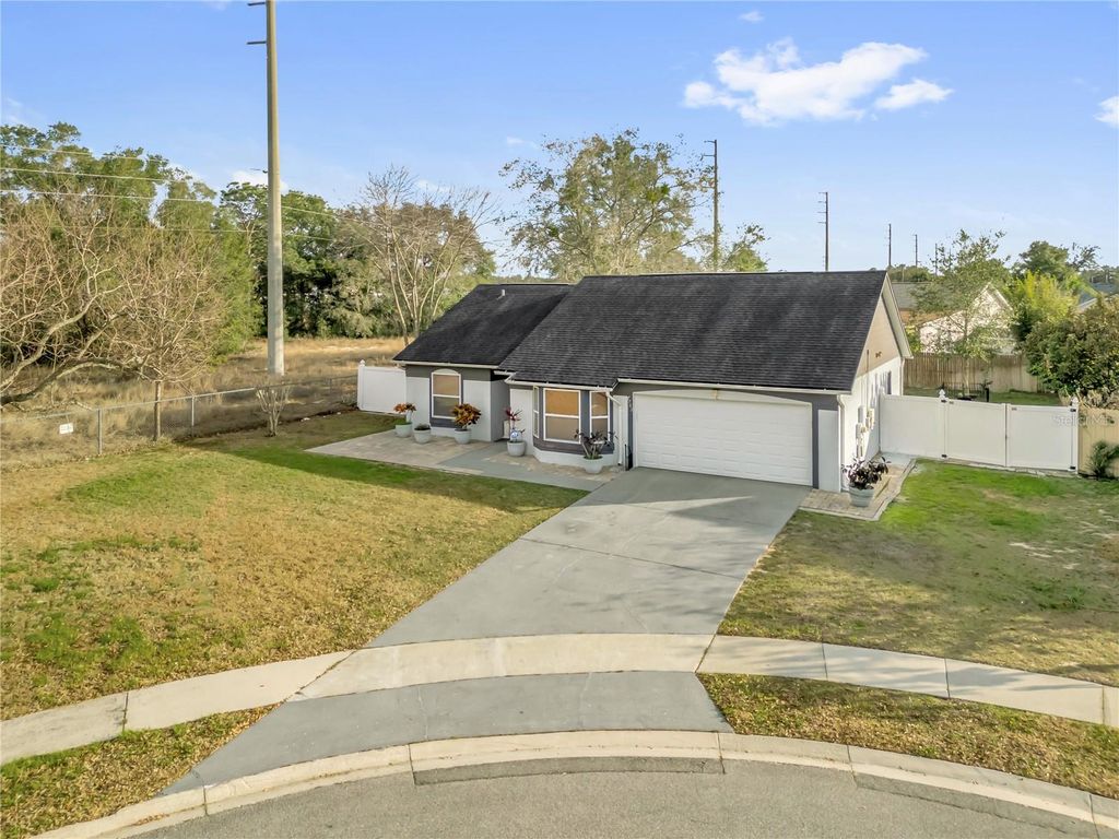 Photo of 7702 Legacy Lane, Orlando, FL 32818 (MLS # O6370165)